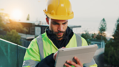 Buy stock photo Man, tablet and construction manager on site with helmet, review project schedule or online research. Person, outdoor and reading on balcony with tech, infrastructure management and renovation plan.