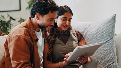 Buy stock photo Couple, relax and tablet in home for connectivity, bonding and quality time with streaming. Happy, together and people scroll on sofa with technology, film app or movie choice with connection