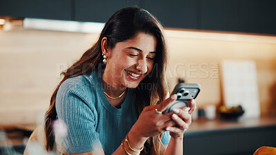 Buy stock photo Smile, phone and woman in kitchen on social media, online dating and reading message with contact. Mobile, happy female person and chat app in home for profile match, connection and text notification