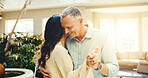 Dance, love and mature couple at holiday home together for anniversary, bonding or romantic getaway. Holding hands, music and smile with married people on vacation for connection, support or travel