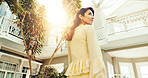 Thinking, woman and smile at resort for holiday, adventure and guest exploring at accommodation. Below, mature person and reflection at retreat with scenic view, travel experience and weekend getaway