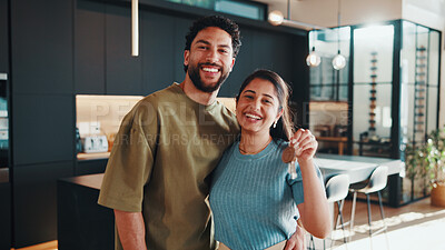 Buy stock photo Portrait, couple and moving in dream home with key, safety and happy for property ownership together. Married people, smile and relocation to new house with keychain, security and real estate goals.