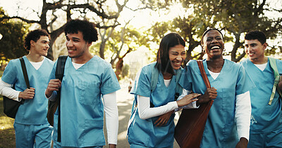 Buy stock photo Happy, friends or nursing student outdoor with walk, connection or peer bonding in medical education. Companion, people or interns with laugh, support embrace or group unity in healthcare residency.