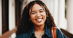 Student, portrait and happy girl with pride in university for academic learning or scholarship. Female person, learner or smile with confidence for academy learnership or higher education on campus