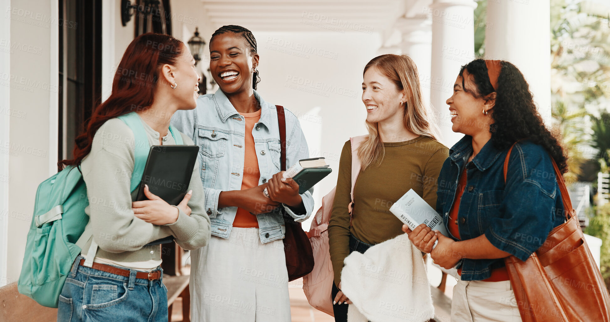 Buy stock photo Girls, student and laughing with conversation for funny joke, humor or comedy together on campus. Female people, academic learner or friends with smile for bonding, gossip or rumor in university
