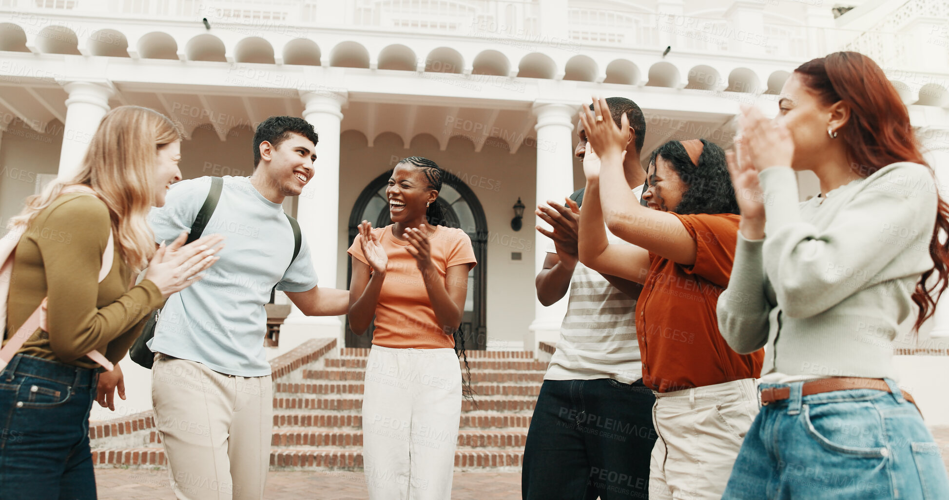 Buy stock photo Student, applause or celebration with friends in university for winning or success on campus. People, community or group of learners clapping with smile for academic mission together on college