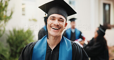 Buy stock photo Laugh, student and man on campus for graduation, academic ceremony and success at university. Graduate, portrait and person at college for studying, education achievement or milestone for scholarship