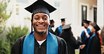 Happy, student and man outdoor for graduation, academic ceremony and education success at college. Graduate, portrait and person at university for studying, achievement and milestone for scholarship