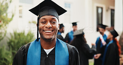 Buy stock photo Happy, student and man outdoor for graduation, academic ceremony and education success at college. Graduate, portrait and person at university for studying, achievement and milestone for scholarship