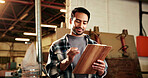 Woodworking, man and writing with clipboard in workshop, manufacturing and artisan with assignment. Carpenter, notes and happy person with checklist, creative and furniture production in factory