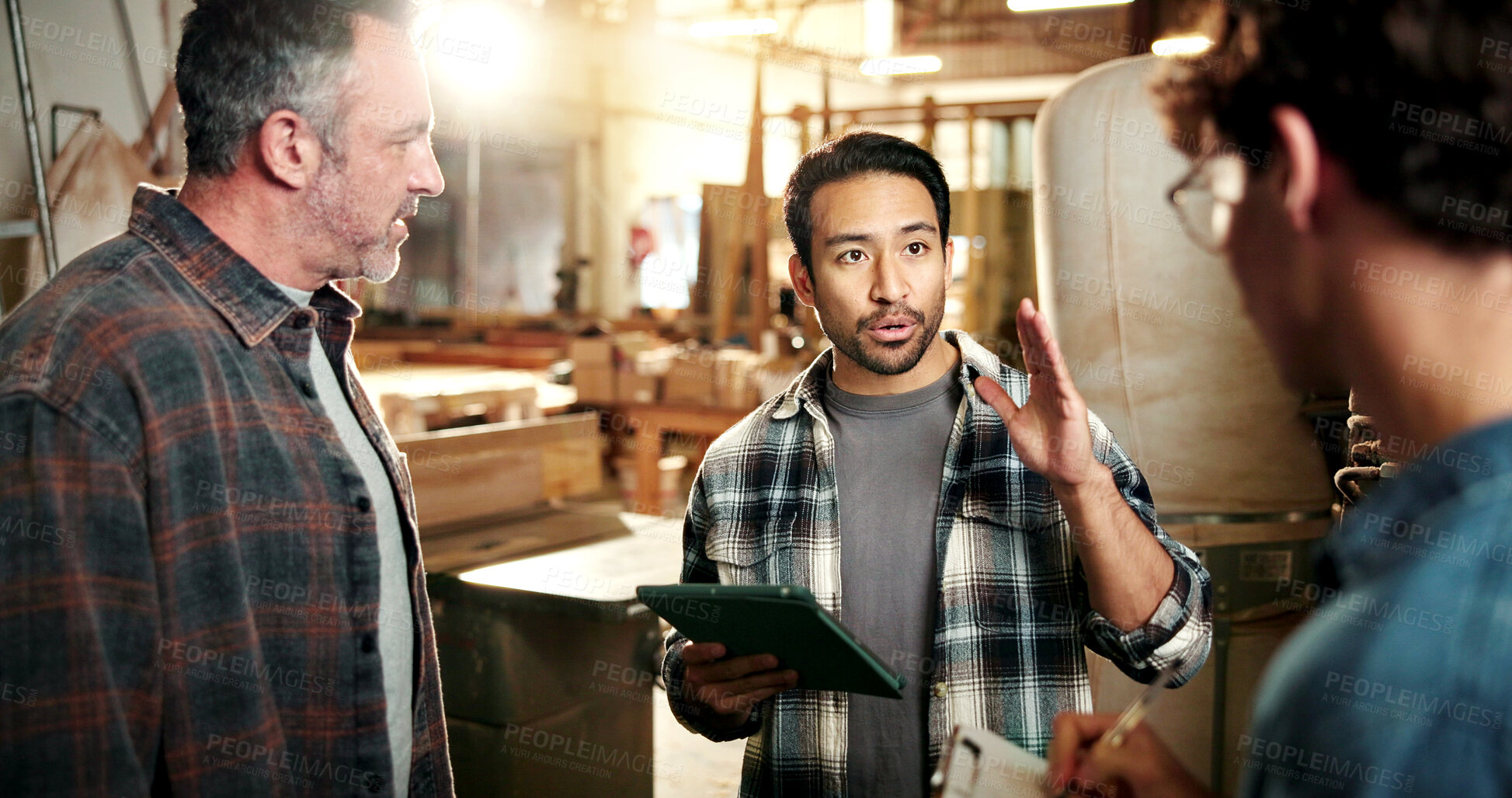 Buy stock photo Carpentry, manager and meeting in workshop with tablet, explain furniture design or woodwork project. Boss, people and discussion in factory with tech, carpenter advice and plan for manufacturing.