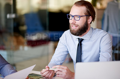 Buy stock photo Businessman, smile and research in meeting for  project administration, proposal and planning in office. Manager, laptop and document with report for discussion, feedback and briefing communication