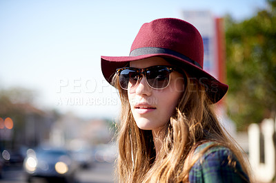 Buy stock photo Travel, sunglasses and woman in city for holiday, weekend trip or getaway with sightseeing. Hat, commuting and female person with adventure on summer vacation in urban town in London for break.