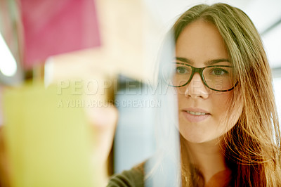 Buy stock photo Businesswoman, writing or sticky note on glass for organizing, planning or brainstorming for campaign. Creative, project management or person in office with glasses, idea and startup timeline.
