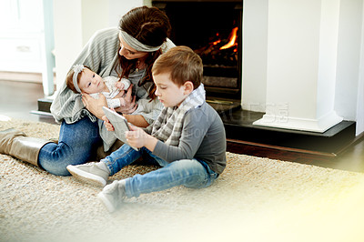 Buy stock photo Tablet, relax and mother with children in home for watching movie, video or film in living room. Digital technology, bonding and mom with kids for streaming show on app together on internet in house.