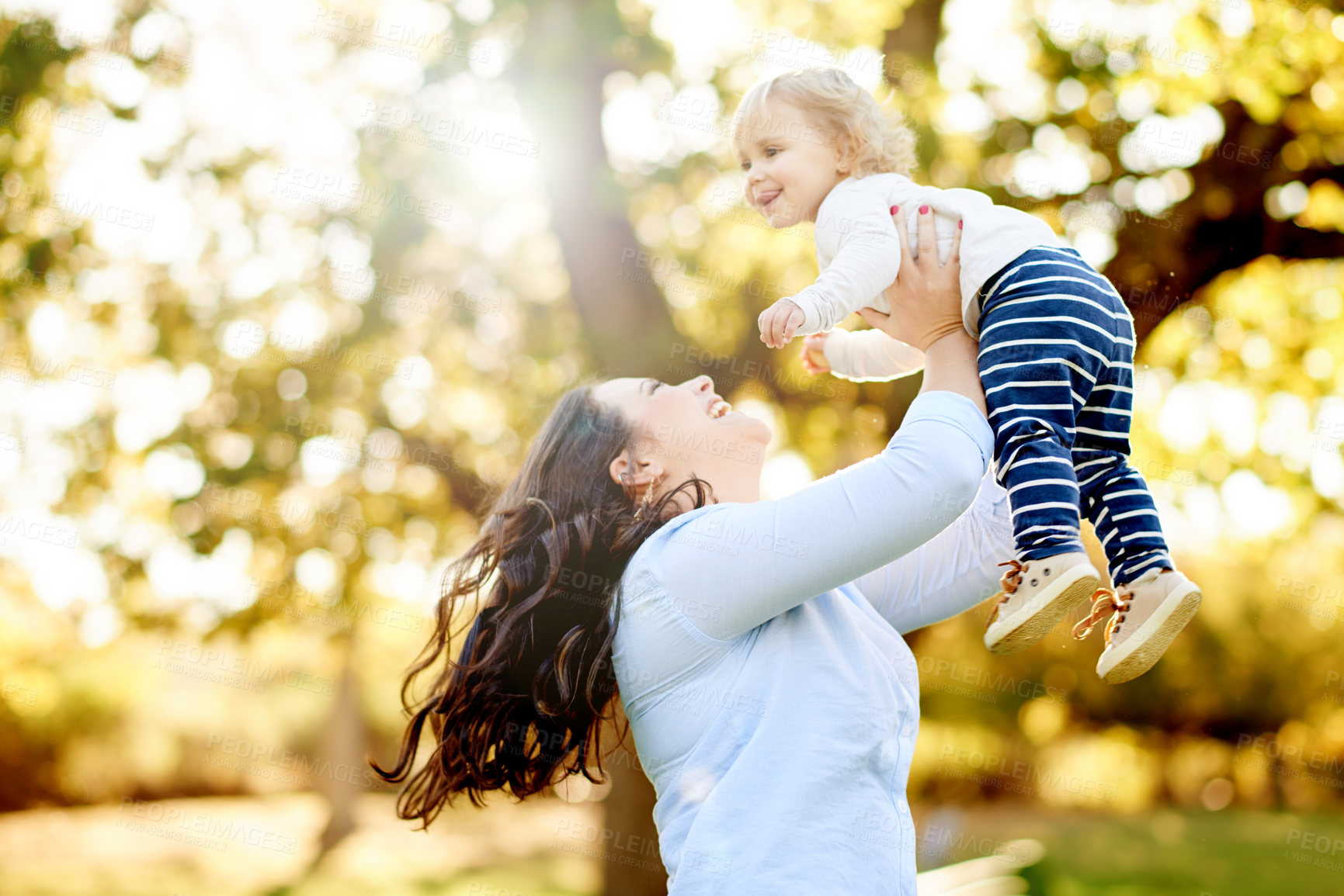 Buy stock photo Love, mother and toddler playing in park for bonding, outdoor space and family time for happiness. Flare, playful child and woman with daughter outside together, care and support for summer fun.