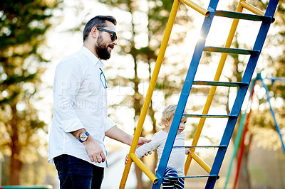 Buy stock photo Nature, jungle gym and dad with child in park for holiday, weekend or vacation together. Smile, trees and girl kid with father for playing outdoor on playground for connection or bonding in summer.