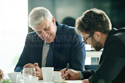 Buy stock photo Happy, men and team with notes, boardroom and planning for wealth management, discussion and coffee. Writing, financial strategy and people with smile for investment opportunity, CEO and accountant