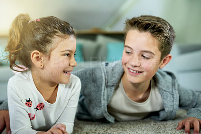 Buy stock photo Family, siblings and happy on home floor, love and together for childhood security. Conversation, children smile and living room carpet to relax for trust, support and relationship bonding to connect