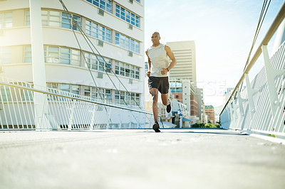 Buy stock photo Running, fitness and exercise with black man in city for cardio challenge, marathon practice and sports athlete. Workout, training and wellness with runner or person on bridge for race and endurance