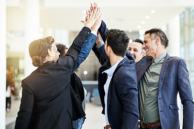 Buy stock photo Business people, team building and high five in office for support, celebration and success. Group, happy workers and hands together for collaboration, motivation and goal achievement with target