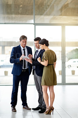 Buy stock photo Communication, office and team with tablet for proposal, sales negotiation plan or business strategy. Digital presentation, discussion and employees with tech to review, collaboration and cooperation