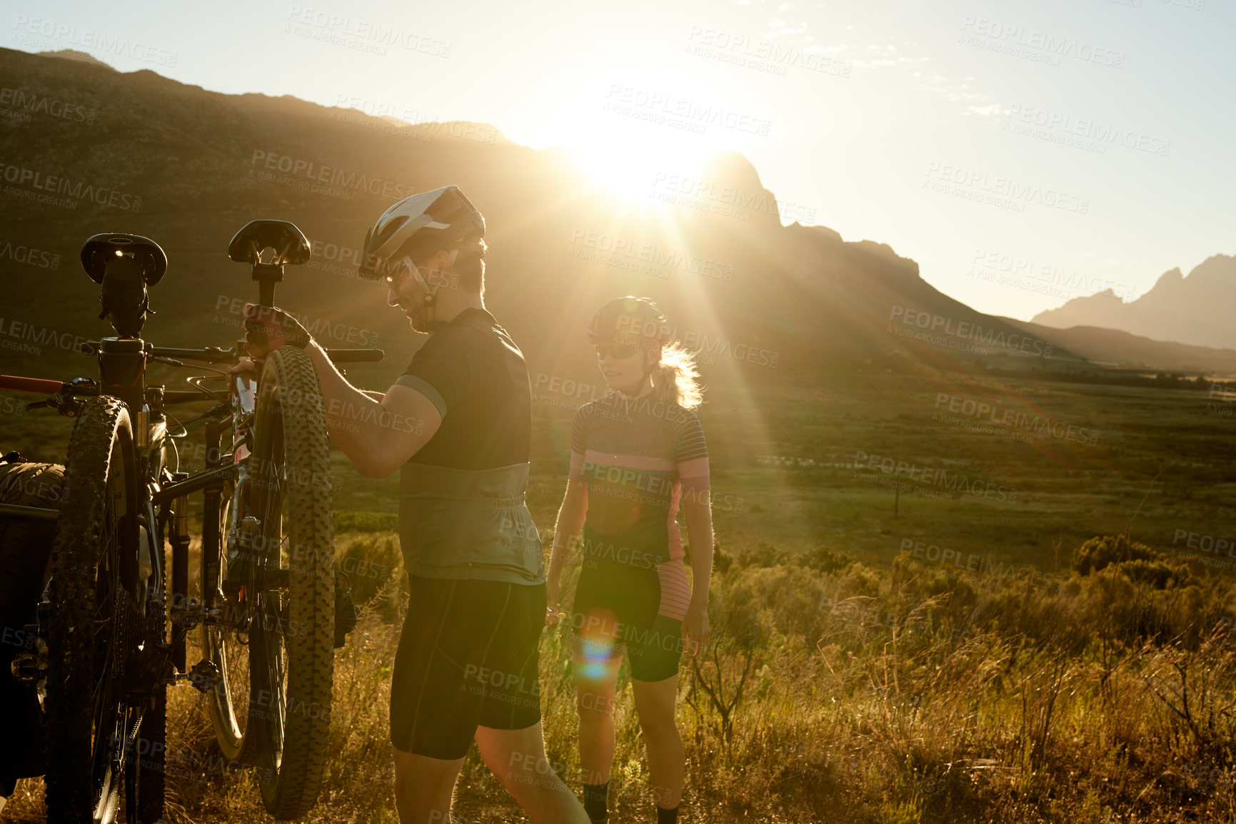 Buy stock photo Fitness, couple and people with bicycle, forest and preparing for competition, healthy and wellness. Outdoor, man and woman with helmet for safety, flare and eco friendly transport for exercise