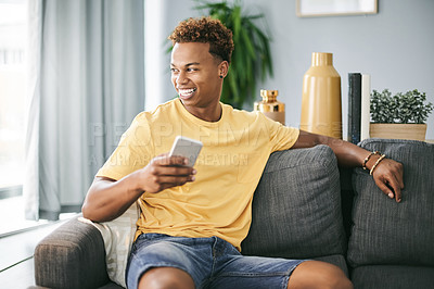 Buy stock photo Ideas, phone and man on sofa in home with networking, communication or social media on mobile app. Happy, thinking and male person with cellphone for texting, contact or chatting in living room.
