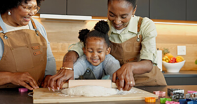 Buy stock photo Baking, kitchen and child with mom, grandma and rolling pin for dough, recipe and learning together. Happy, family and black girl with mother, grandparent and help for ingredients, meal prep and fun