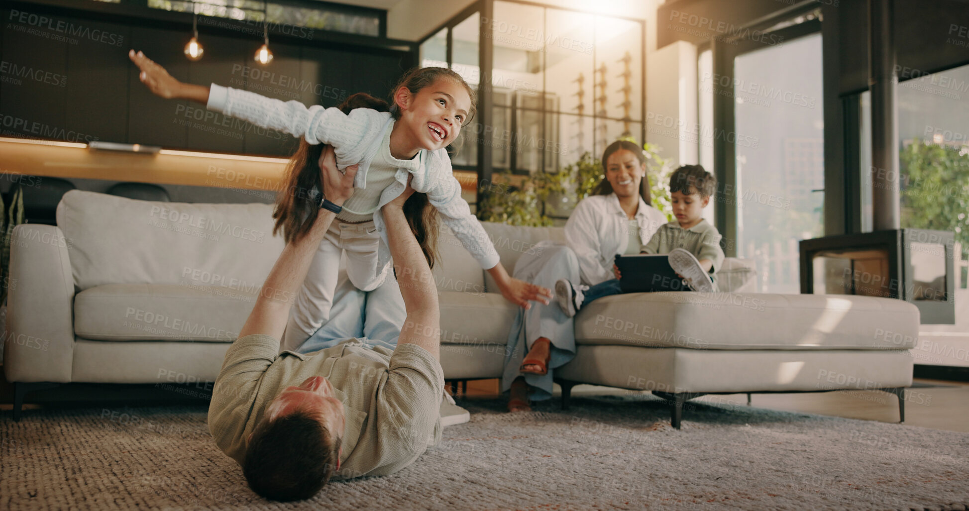 Buy stock photo Father, airplane and play with child in home for support, quality time and bonding with smile. Happy girl, dad and flying game in family house with care, fun and laugh on floor with parent connection