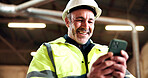 Happy, construction and mature man with phone for message, connection and chat with supplier. Engineering, supervisor and person on cellphone, internet and networking for remodeling in warehouse