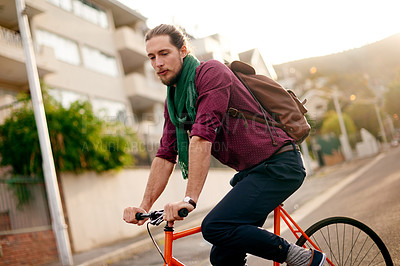 Buy stock photo Journey, adventure and man on bicycle in city for commuting, outdoor or carbon footprint. Street, cycling and male person on bike for eco friendly transport on vacation, weekend or holiday for travel