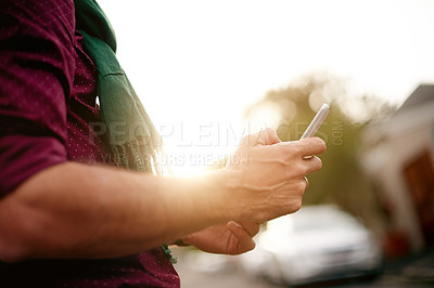 Buy stock photo Hands, travel and man with phone in street for holiday adventure, vacation or chat. Mobile, outdoor or tourist texting in city for tourism app, social media website or news notification in urban town