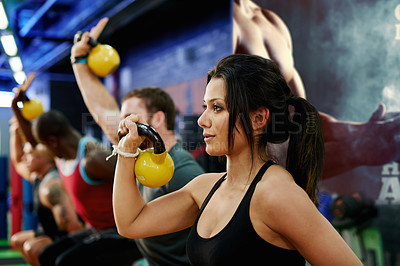 Buy stock photo Gym, fitness class and kettlebell for exercise, power and sports challenge for muscle. People, bodybuilder and heavy weights for training with health club, workout group and personal trainer athlete