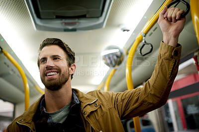 Buy stock photo Bus, travel and man with smile, passenger and public transportation with road trip. Ride destination, happy person or morning commute with city service, safety or holding rail in vehicle with journey