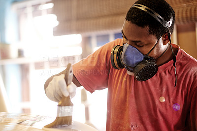 Buy stock photo Mask, brush and black man with surfboard, painting and creative for talent and hobby skills. Craftsman, artist and resin with workshop PPE for design, manufacturing and custom work for artisan craft