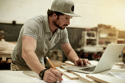 Buy stock photo Laptop, furniture and drawing with man in workshop for design, artisan project and carpenter. Manufacturing, online sketch and woodworking with male person for crafting, check and quality control
