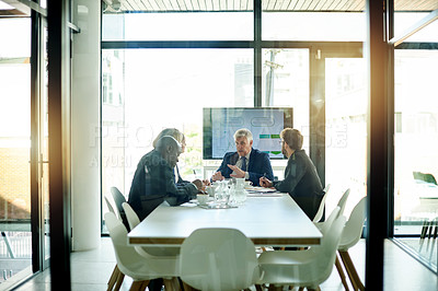 Buy stock photo Meeting, business and people talk in office with discussion, finance report and stock chart. Mature man, explain and staff listen for value growth, trading team and profit increase with data analysis