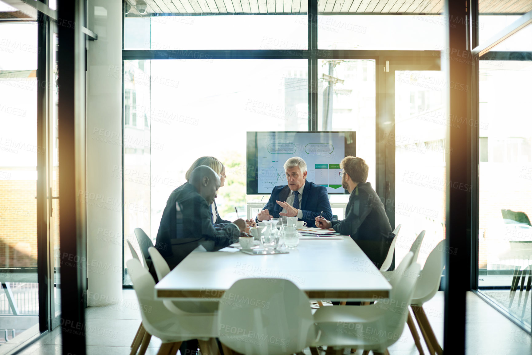 Buy stock photo Meeting, business and people talk in office with discussion, finance report and stock chart. Mature man, explain and staff listen for value growth, trading team and profit increase with data analysis