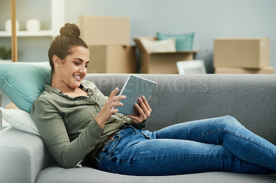 Buy stock photo Chill, moving and woman with tablet, home and research for renovation of apartment, app and website. Relocation, boxes and person with tech for house improvement, browsing or info for interior design