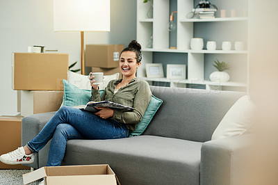 Buy stock photo Homeowner, book and woman with smile, portrait and boxes with real estate, break or novel. Apartment, new property and happy person on sofa, coffee or literature with hobby, relocation or achievement