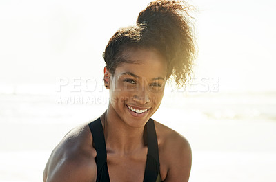 Buy stock photo Portrait, fitness and woman in outdoor with smile, muscle and wellness at beach. Happy, relax and African athlete at ocean with space, exercise break and commitment in morning. 