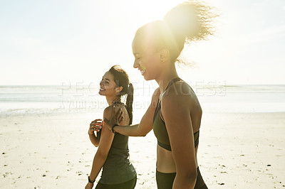 Buy stock photo Friends, relax and athlete women on beach for fitness, running break and bonding together. Space, people and walk with flare for cardio exercise, sports training and recovery from workout or wellness