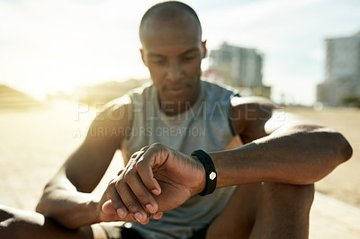 Buy stock photo Hands, smart watch and check stats in city, break and stopwatch for fitness, exercise and training. Person, runner and rest with IoT clock, timer or app for heart rate for cardio challenge in town