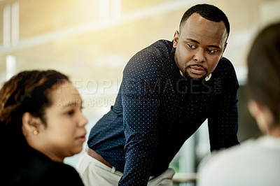Buy stock photo Business, man and meeting with staff in office for discussion, planning and headline ideas. Manager, talking and team listening for article feedback, brainstorming and proposal for online magazine
