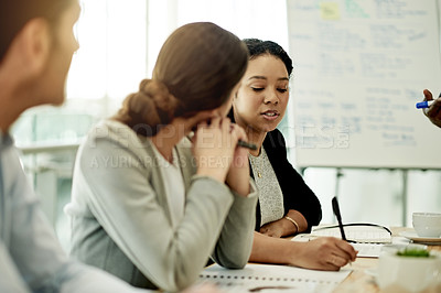 Buy stock photo Business, woman and writing notes in meeting for planning, article ideas and schedule reminder. Team, talking and notebook for feedback, brainstorming and headline information on story publication