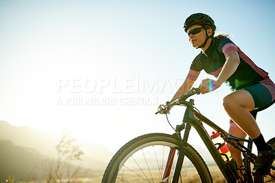 Buy stock photo Woman, cyclist or nature with bicycle for cardio exercise, extreme sport or outdoor adrenaline. Active, female person or cycling with bike, helmet or blue sky for health, workout or training on space