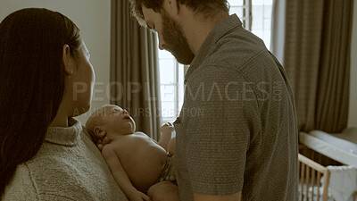 Buy stock photo Hug, mother or father with baby in a family to relax or bond together for care or child development. Love, parents or proud dad with a mom or newborn infant for support, trust or comfort at home