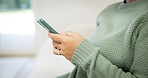 Hands, phone and woman in home with social media, download app or forum communication on internet. Mobile, person and text message in lounge, chat notification or follow account with subscription