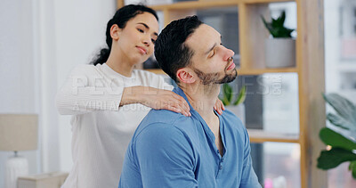 Buy stock photo Couple, home and shoulder with massage for stress relief, comfort or physical therapy together. Calm man, woman and  kneading with relaxation, trust or support for touch, health or wellness in house